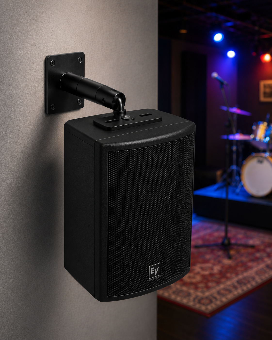 Wall-mounted speaker using UniFlex adjustable bracket